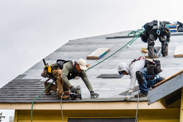 Professional Gutter Installation technician working in Riverdale, MD